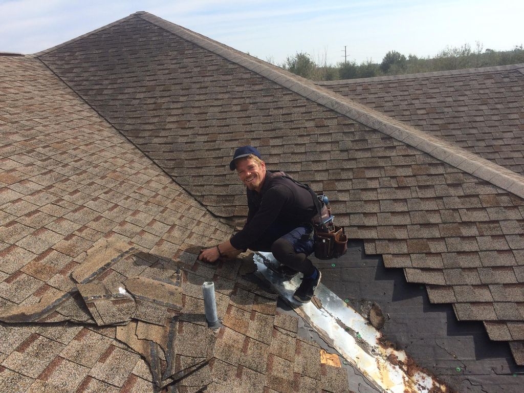MAD Roofing INC