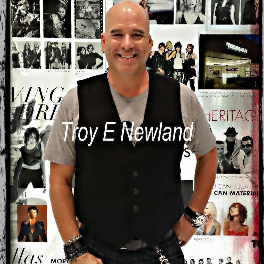 Troy E Newland
