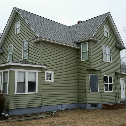 100 YEAR OLD FARMHOUSE AFTER NEW ROOF, SIDING, WIN