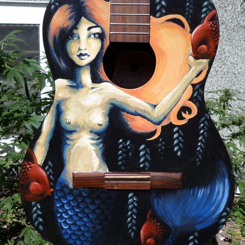 Guitar I painted in Canada. Acrylic paint and varn