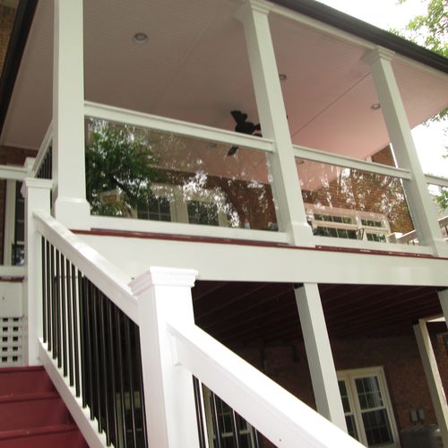 New deck with aluminum picketts and glass rail at 
