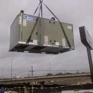 Crane Lifting Package Unit onto Roof at Sketchers 