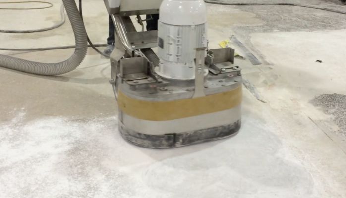 Grinding to a clean surface for your new flooring.