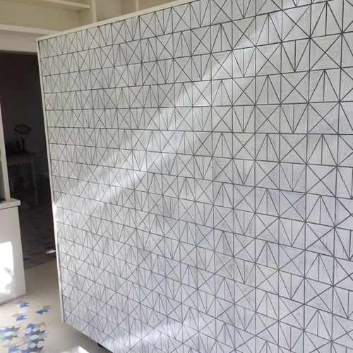 A wall with my tile installed and interior shot th