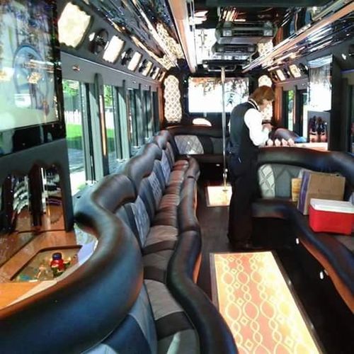 New limo bus with bartender!