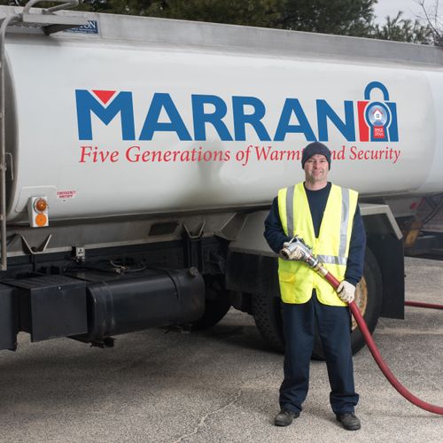 A Marran oil delivery truck and driver