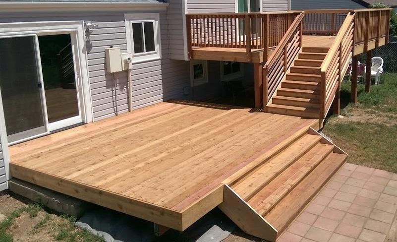Redwood Deck with Cedar Wrap and Redwood Railing. 