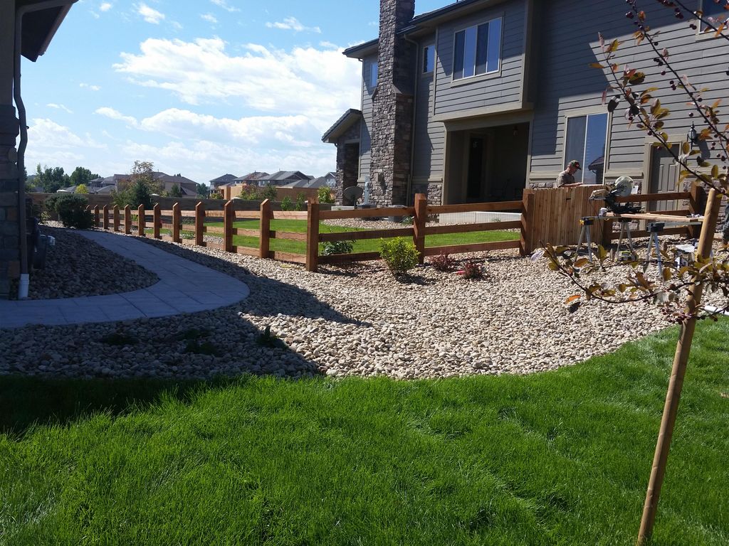 3 rail cedar Fence with welded wire