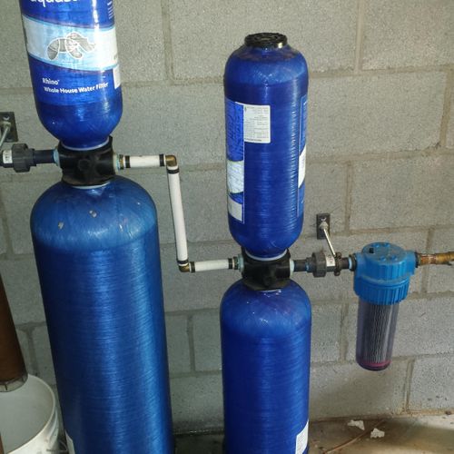 Install whole house water filter