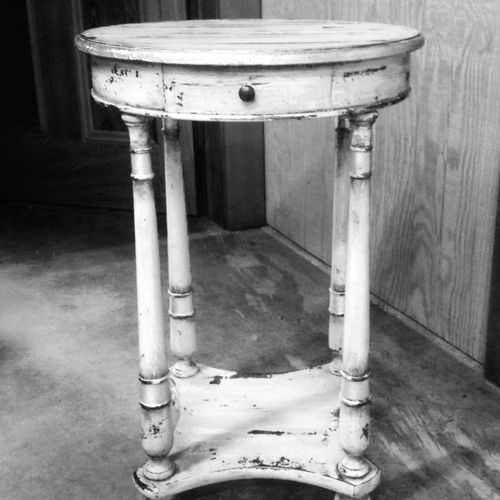 Small side table with a rustic finish