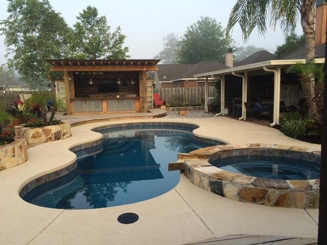 The pool is not our work, yet our outdoor kitchen 