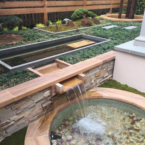 Modern water feature with Japanese influence
