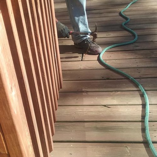 Fixing loose boards on back deck
