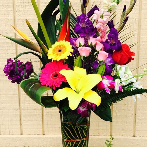 Hawaiian Breeze... heliconia, stock, orchids, rose