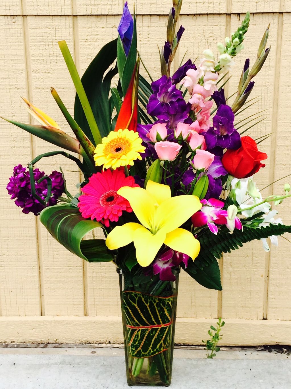 Hawaiian Breeze... heliconia, stock, orchids, rose