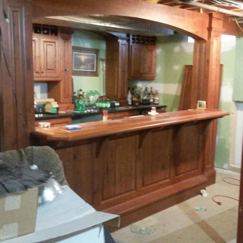 Basement remodel with bar.