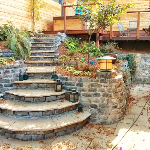 Masonry stairs and Deck with hot tub.