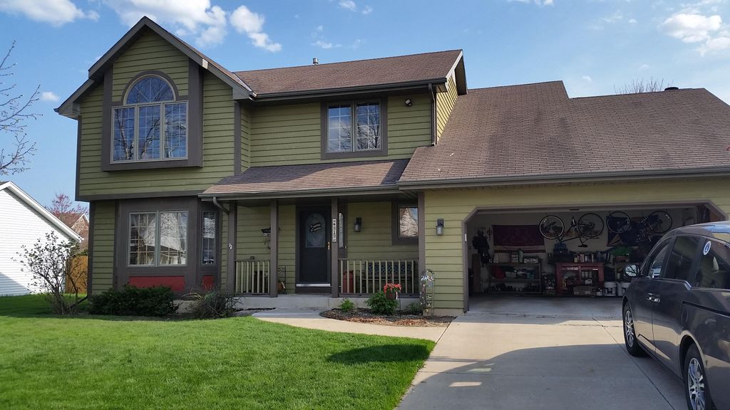 Prepped and painted cedar home