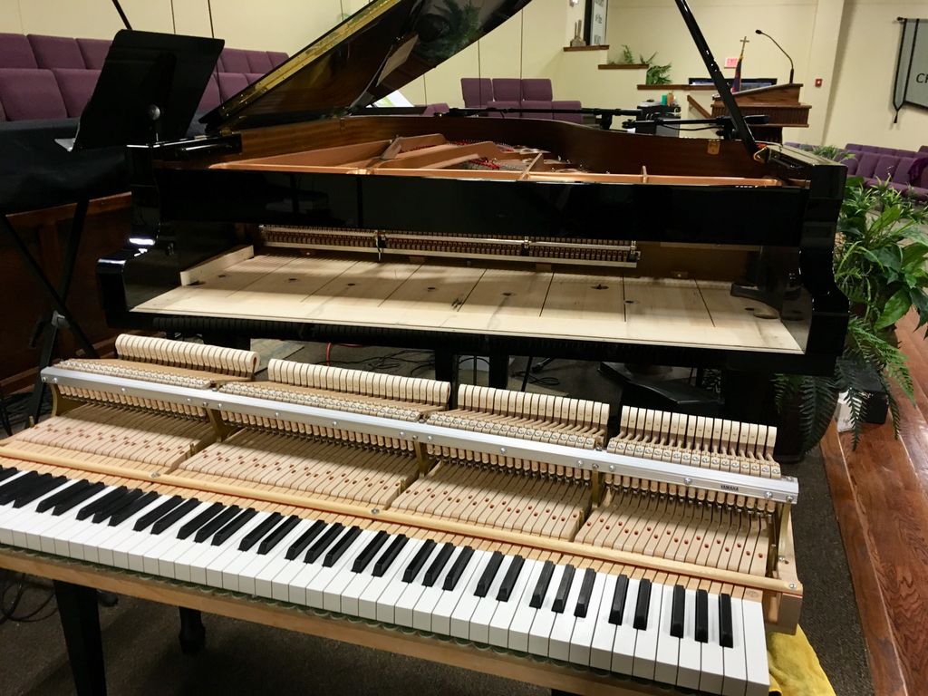 Action work on a Yamaha C6
