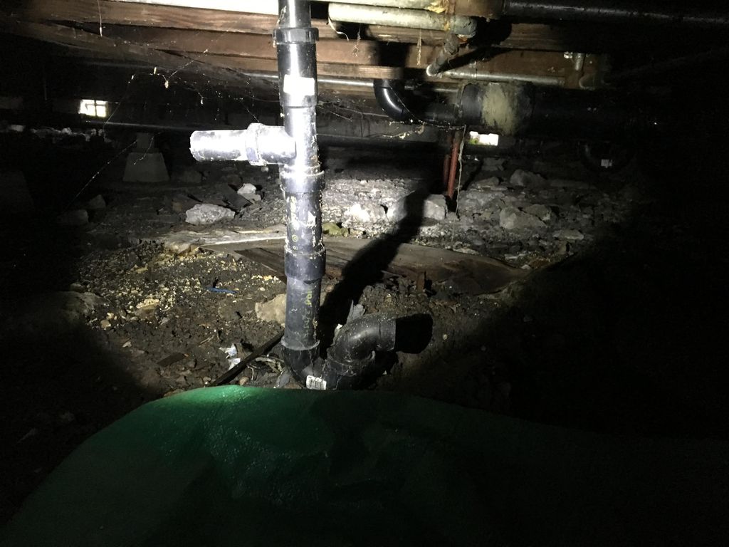 Broken tub drain line. (Before)