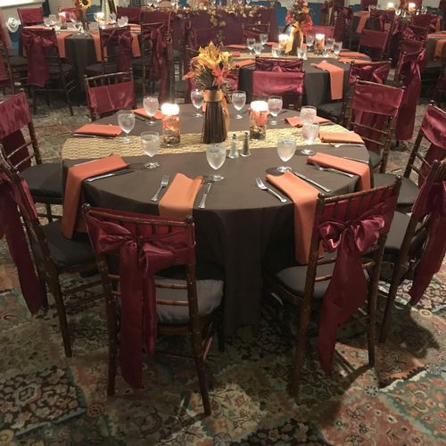 Fall themed wedding reception guest tables.