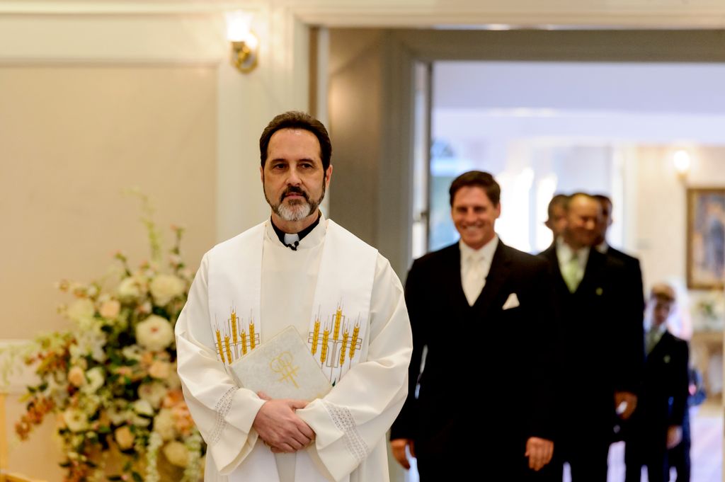 Leading the Groom and Groom's men down the isle in