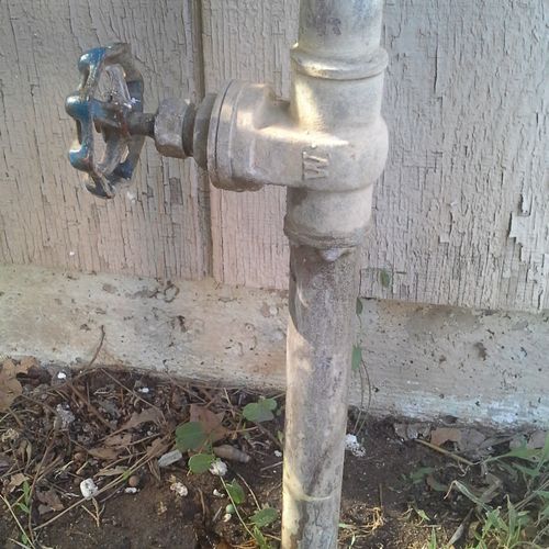 Water main leaking just below valve.