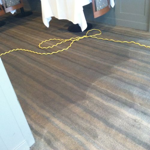 Cleaning results on a light fabric carpeting.