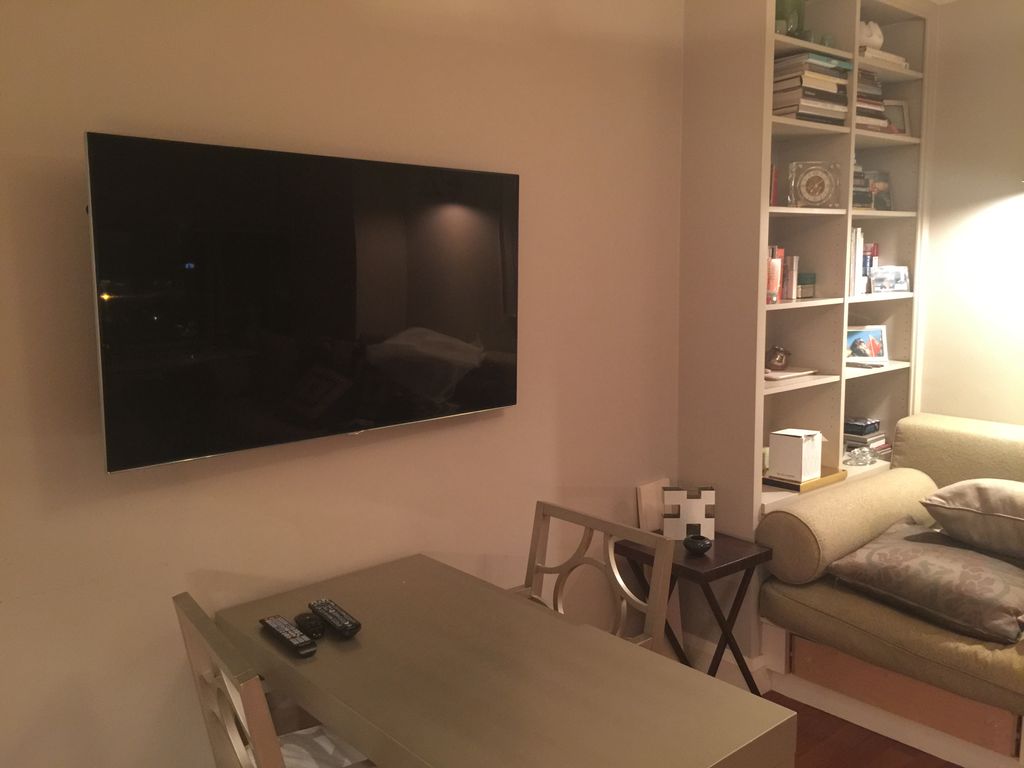 55" inch Wall mount and upgrade on West 57th stree