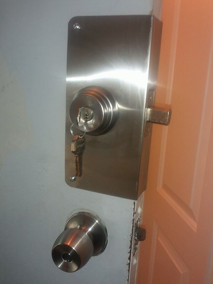 installed deadbolt with reinforced wrap around.