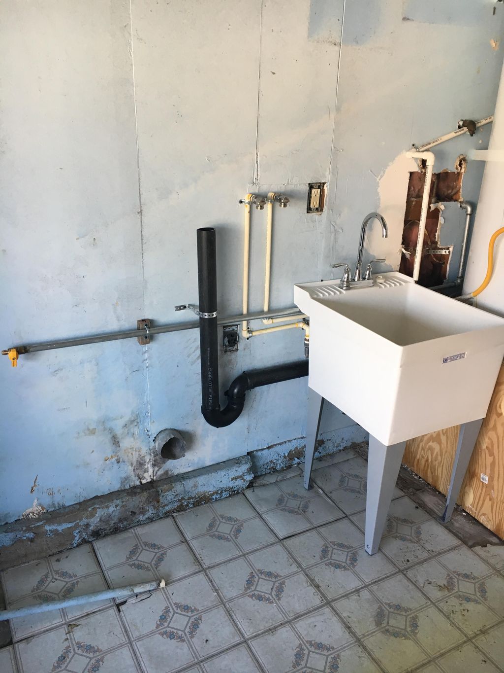 After new laundry and laundry tub