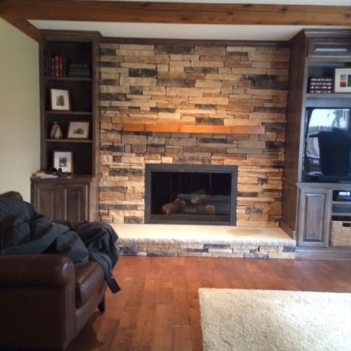 Remodel floor and fireplace wall. Added hardwood, 