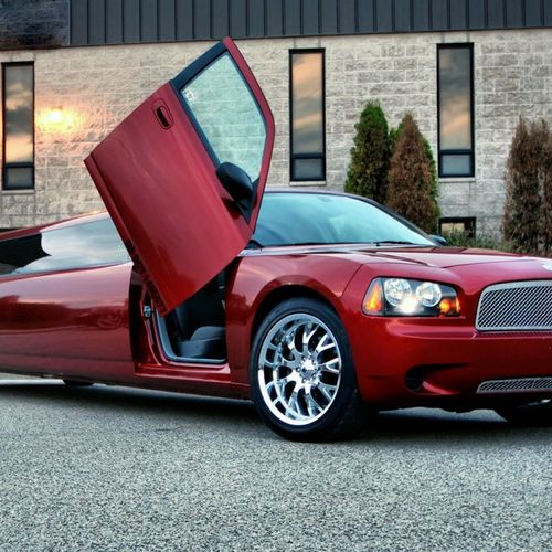 10 PASSENGER RED CHARGER LIMO