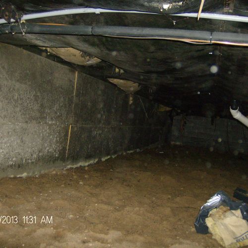 Crawlspace before we cleaned up and put in new cra