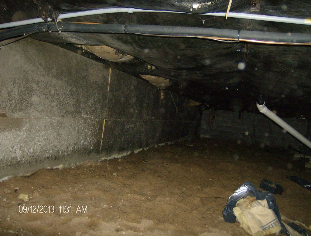 Crawlspace before we cleaned up and put in new cra