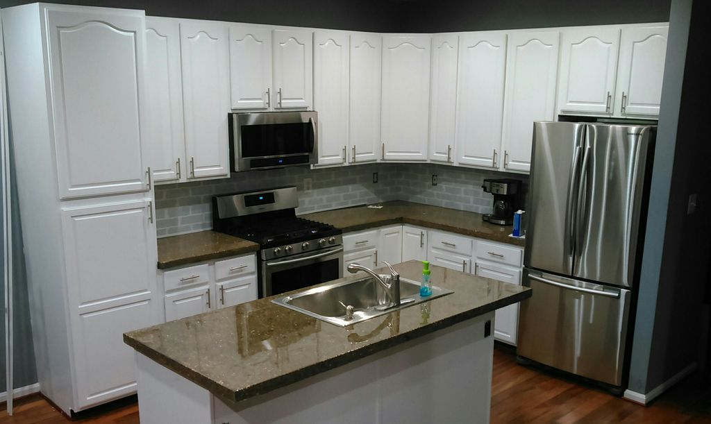 Custom concrete countertops, painted cabinets, new