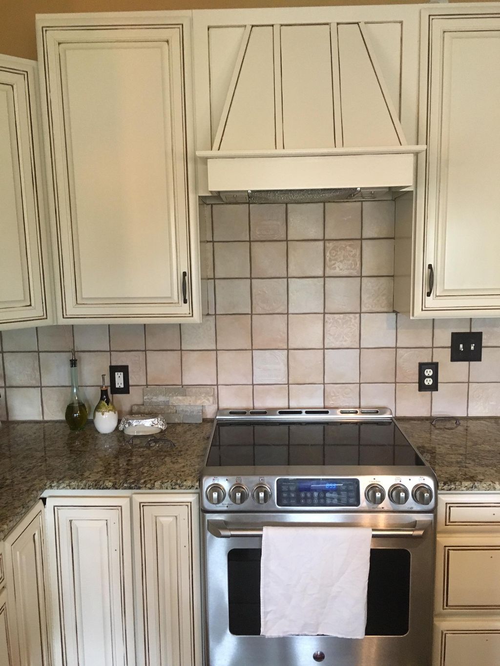 Natural maple to an off white with pin stripe glaz