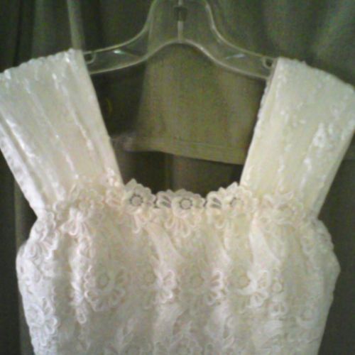 straps added to wedding gown