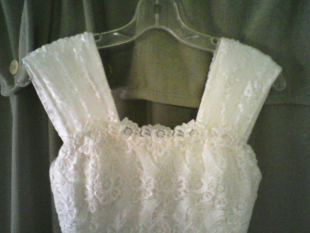 straps added to wedding gown