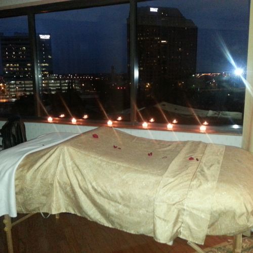 Massage done overlooking Richmond night skyline fr