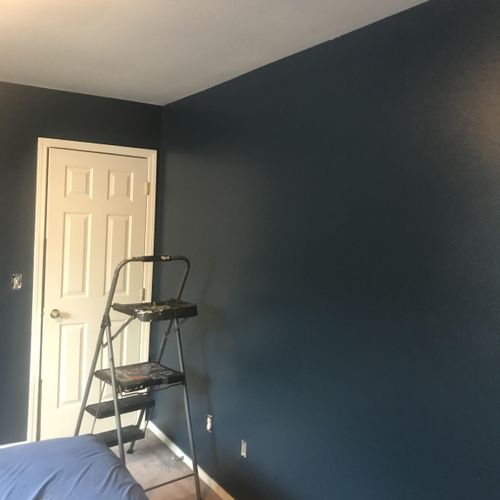 Fresh accent wall paint in master bedroom 