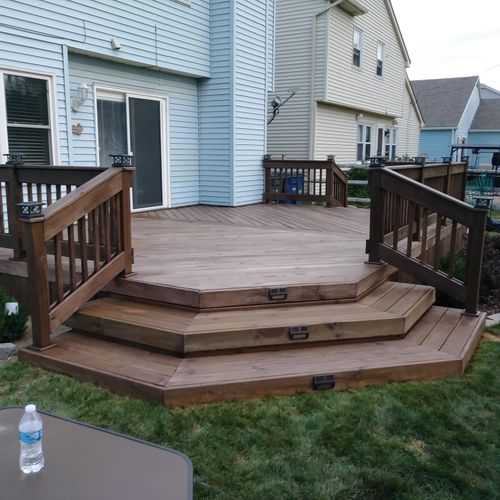 new deck with octogonal steps and stained finish