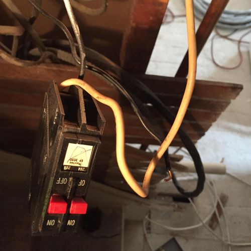 Old faulty wiring caused the breaker to burn up. A
