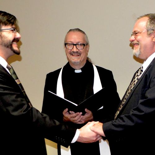 Rev. Ramsey officiating for Greg and Stephen's wed
