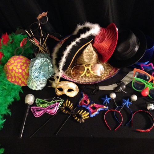 Props include boas, hats and crazy glasses