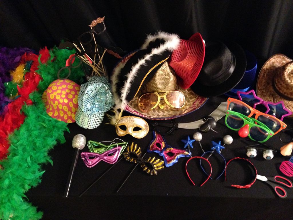Props include boas, hats and crazy glasses