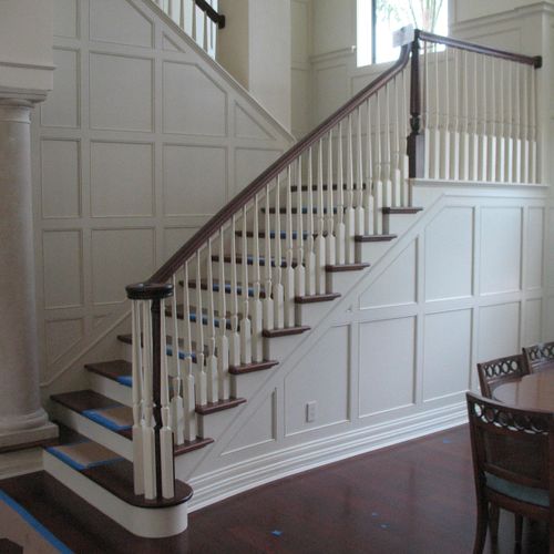 The finish photo of a wainscoting and stair projec