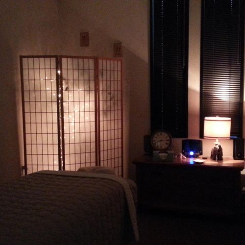 Soft lighting makes this massage room so relaxing.