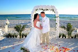 Wedding on the beach with arbor. We can help you i