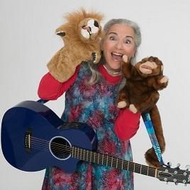 Mrs. Kate and the puppets she uses in her "Let's E